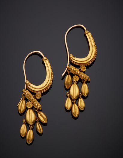  Pair of yellow gold (750‰) "sleeper" EARRINGS, finely beaded and twisted, each holding...