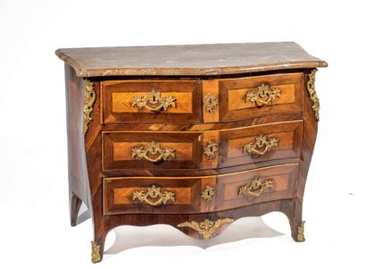 Inlaid chest of drawers opening with four...
