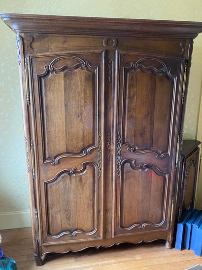  Molded and carved oak cabinet opening with two doors. 215 x 141 x 59 cm
