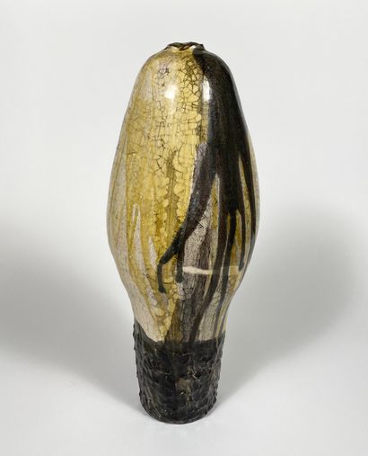 Large ovoid ceramic vase glazed with coulures....