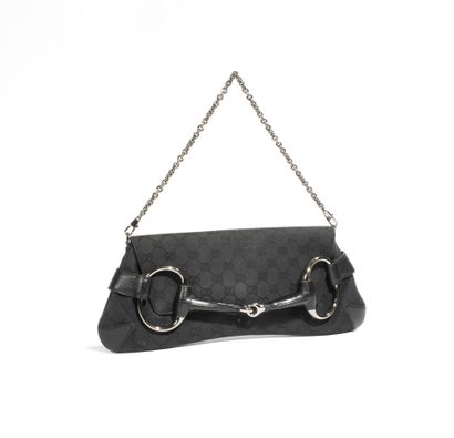  GUCCI 
 
Bag model "Mors" in black leather and canvas monogrammed "Guccissima" black,...
