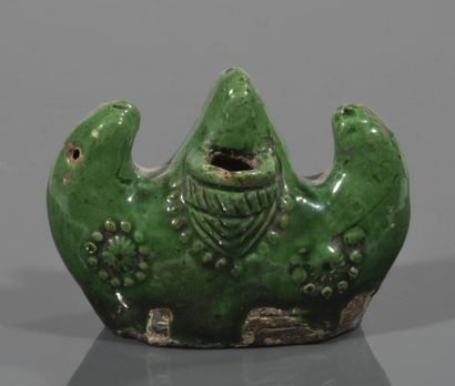 Green ceramic dropper with three 
 protuberances...