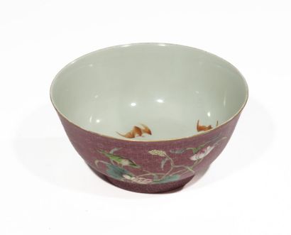 Bowl decorated with flowers on a purple background,...