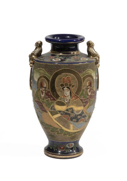 A Satsuma ceramic vase decorated with deities...