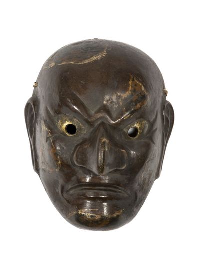 Large wooden mask representing an ancient...