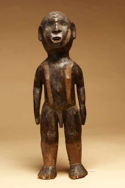 Male statue with scarified face, wood with...