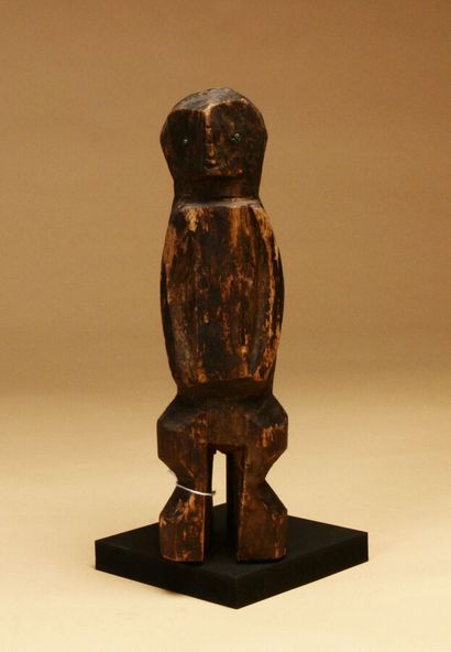 Wooden statue with old oxidized patina, the...