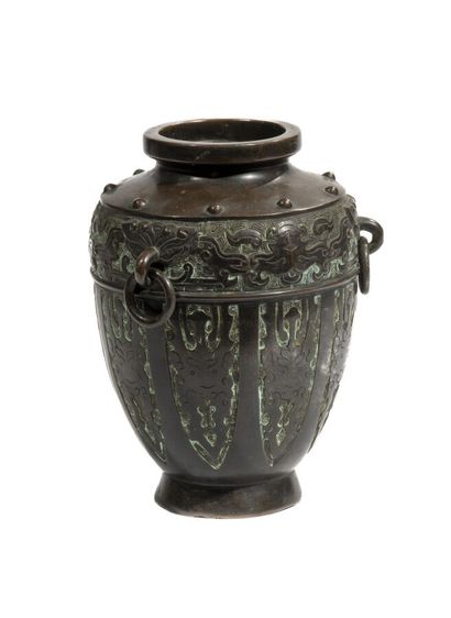 Bronze vase of archaic style with three handles,...