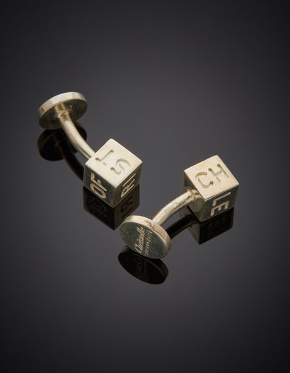 CHRISTOFLE Pair of silver (925‰) "cube" HANDLEBUTTONS engraved "CH-RI-ST-OF-LE"....