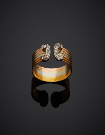 WEMPE "Two C" open ring, three gold (750‰) gadrooned, finished with two alignments...