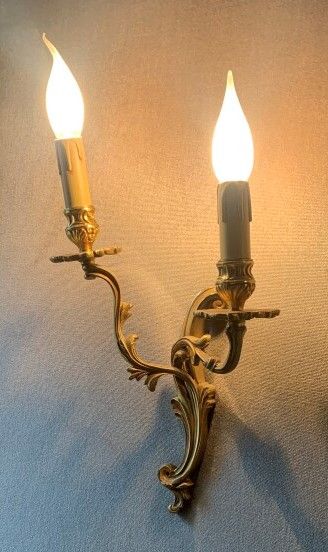 Pair of two-light gilt bronze sconces in...