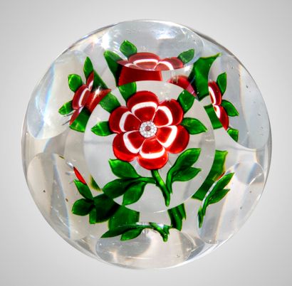  Baccarat.paperweight decorated with a pink and white primrose with six petals on...