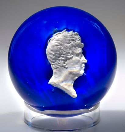 Clichy. Paperweight with blue background...