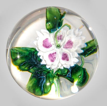Rare paperweight decorated with a white and...