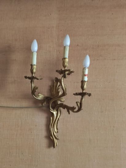 Pair of three lights sconces in chased and...