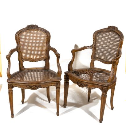 Pair of armchairs in molded and carved natural...