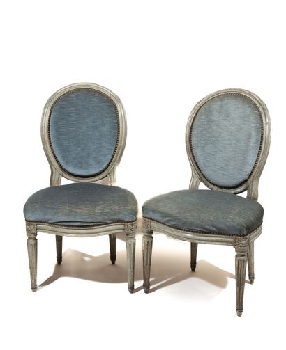 Pair of chairs in molded, carved and relacquered...