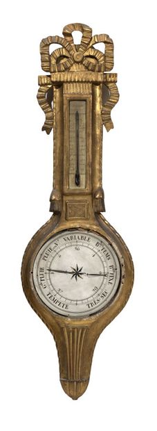  Barometer-thermometer in a carved and gilded wooden frame decorated with a ribbon...