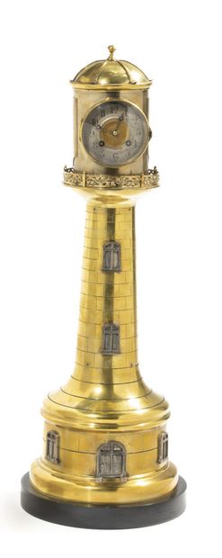  André-Romain GUILMET (1827-1892) 
Pendule phare à mouvement en forme de phare nautique....
