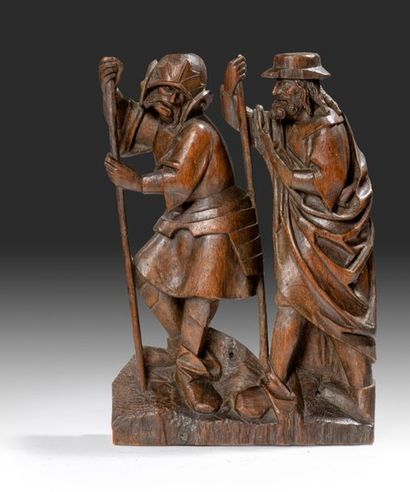  Groupe en haut-relief en chêne sculpté Représentant deux personnages, dont un soldat...