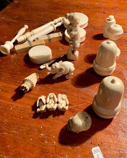 null Set of nineteen pieces of carved bone or ivory: boxes, syringes, tassels, skull...