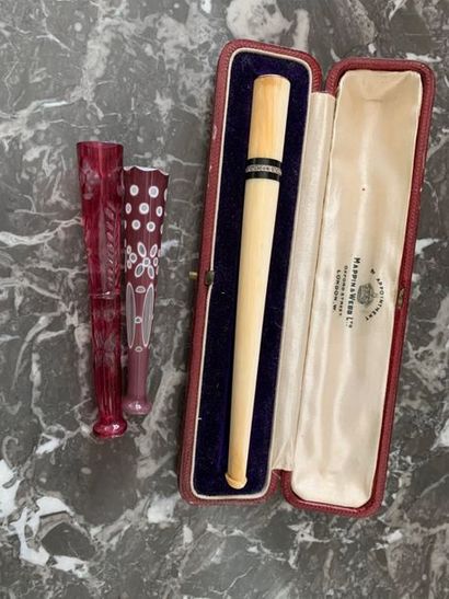 null Set consisting of three cigarette smokers:
- one in ivory, the tip in silver,...