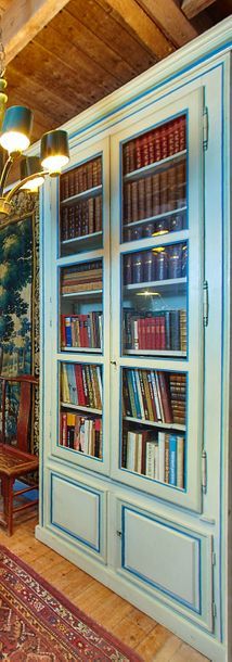 null Narrow and high bookcase in water green lacquered wood with green and blue rechampi....