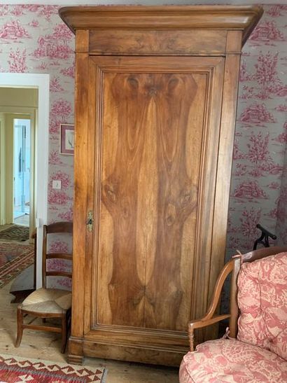 null Moulded fruit-wood hosier with one door.
Mid-19th century.
Height: 242 cm. Width:...