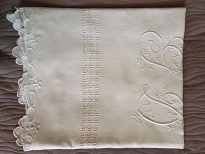 null Linen canvas sheet, the border with mantling and scrolls and flowers, openwork...
