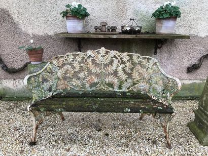 null Cast iron garden bench decorated with an interlacing of ferns branches.
Height:...