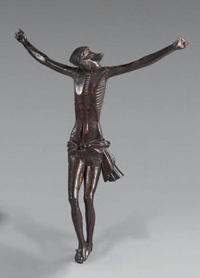 null Christ en bois sculpté et patiné.
XVIIe siècle.
H. : 48 cm. L. : 35 cm.
Accidents...