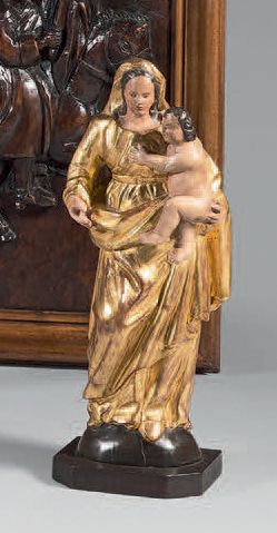 null Statue de Vierge à l'Enfant en bois peint et doré.
XVIIe-XVIIIe siècle.
H. :...