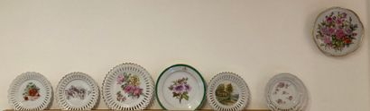null Mannette of decorative and dessert plates in white porcelain, mainly with polychrome...