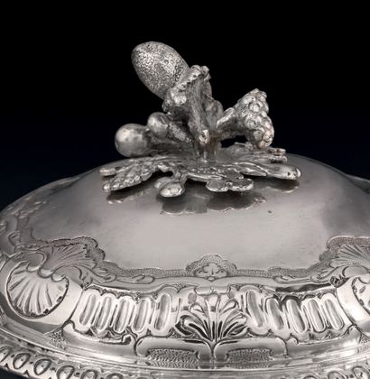 null Silver covered sugar bowl, of baluster form, standing on four scrolled feet;...
