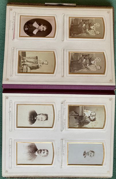 null Album of old photographs. The binding in red embossed chagrin. Missing the ...