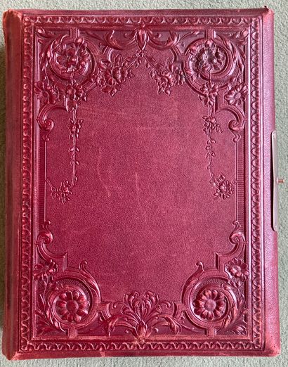 null Album of old photographs. The binding in red embossed chagrin. Missing the ...