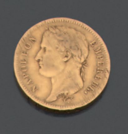 null FRANCE. Coin of forty francs in yellow gold with the profile of Napoleon laureate,...