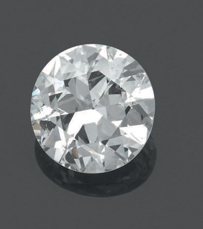 null Bague demi-jonc en or jaune 18K (750), sertie d'un diamant taille moderne de...