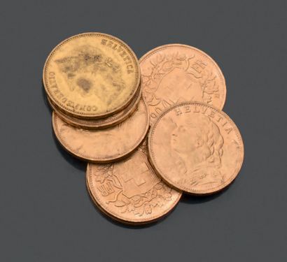 null SUISSE. Sept pièces de vingt francs en or jaune. 1889 (1) - 1922 (2) - 1935...