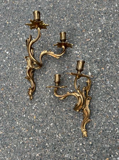 null Pair of sconces in cast and gilt bronze with two arms of light, the arms of...