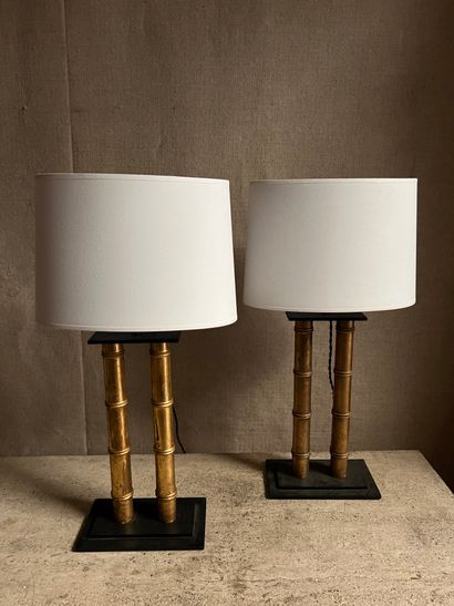 null Pair of lamp bases made of two gilded wooden shafts simulating bamboo, mounted...
