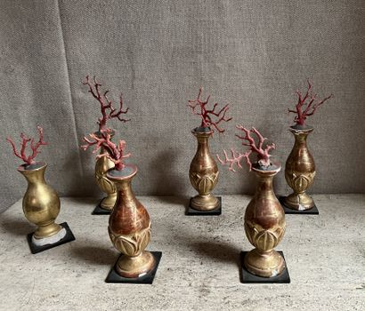 null Suite of five gilded and patinated wood balusters decorated with lotus leaves...