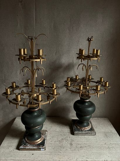 null Pair of girandoles formed by a baluster in green patinated and gilded wood,...