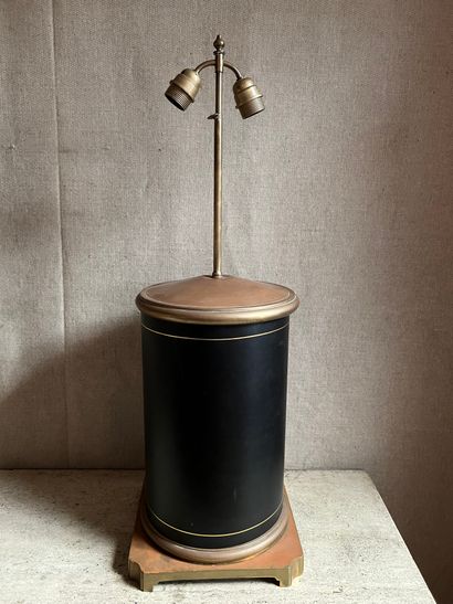 null Lamp stand in sheet metal and brass of circular form, trimmed with black leather...