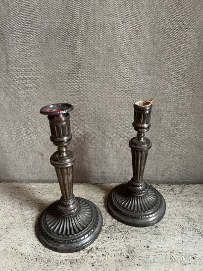 null Pair of silver plated bronze torches, decorated with friezes of ovals and ribbons....