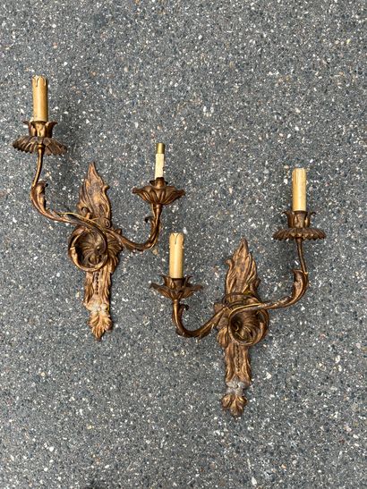 null Suite of four sconces in cut sheet metal with golden patina, decorated with...