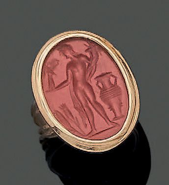 null 
Ring in 18K (750) yellow gold, set with an oval intaglio on jasper representing...
