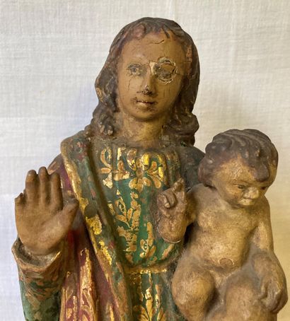 Statuette de Vierge à l'enfant en bois sculpté...