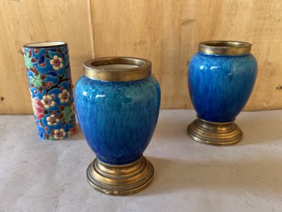 null A pair of small ovoid vases in Sèvres earthenware with a shaded turquoise background,...