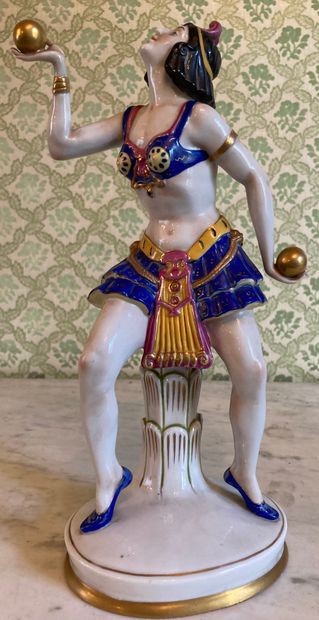 Porcelain statuette enhanced with polychromy...